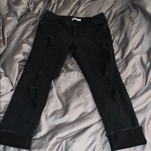 Black ripped capris